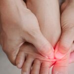 Do jakiego lekarza z haluksami